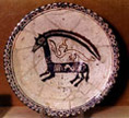 نقاشى روى پوشش گلى زير

لعاب، نيشابور، قرن 4 هجرى

قمرى