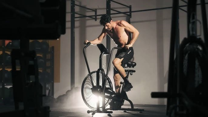 A person on an exercise bikeAI-generated content may be incorrect.