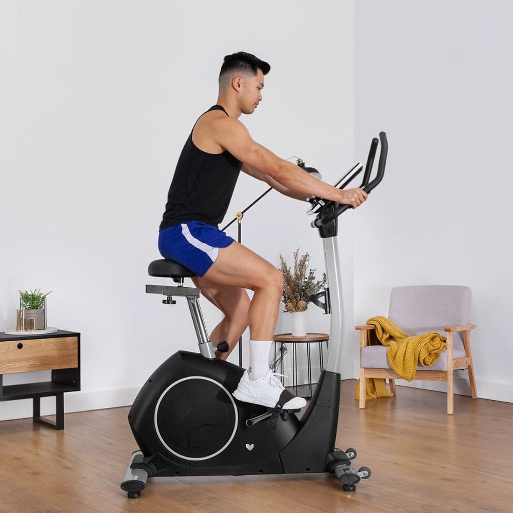 A person on an exercise bikeAI-generated content may be incorrect.